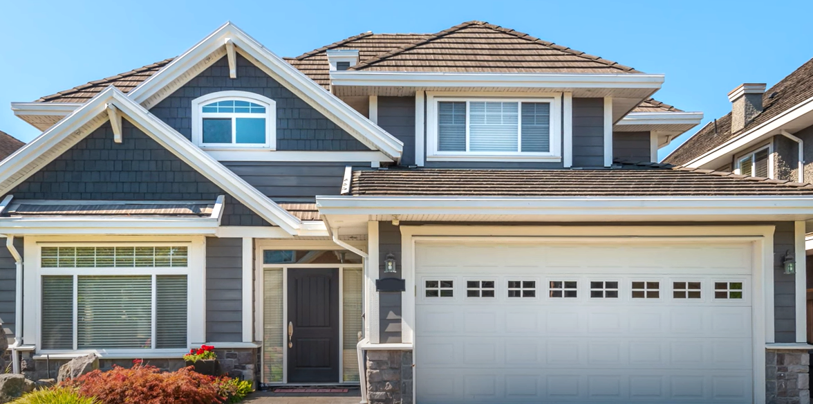 Professional team performing garage door repair in Laurel, Florida, specializing in expert maintenance for residential and commercial properties.