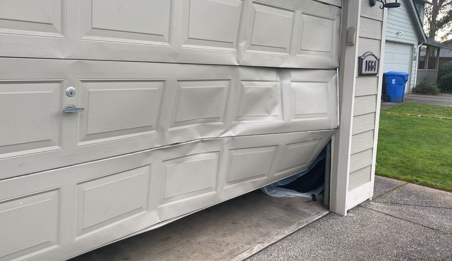 garage door panel needed to be repair.