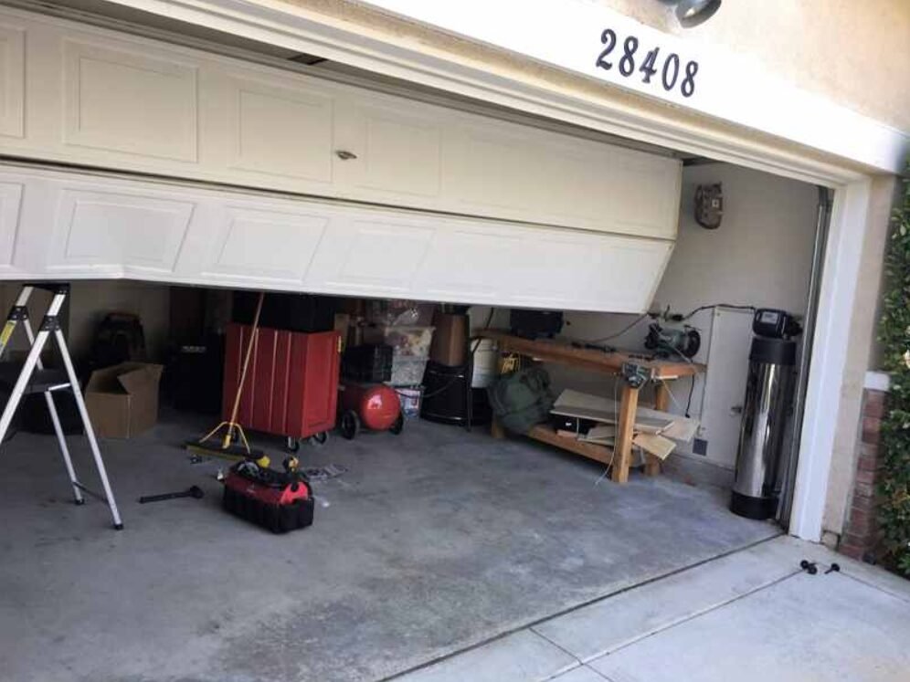 How to Handle an Off-Track Door with Emergency Garage Door Repair